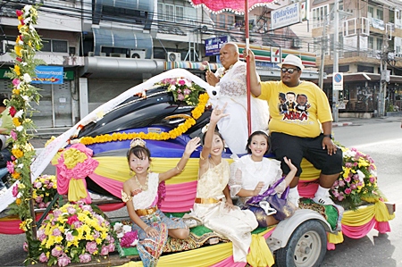 Satit Puakpong arrives on his chariot en route to ordaining as a novice monk.